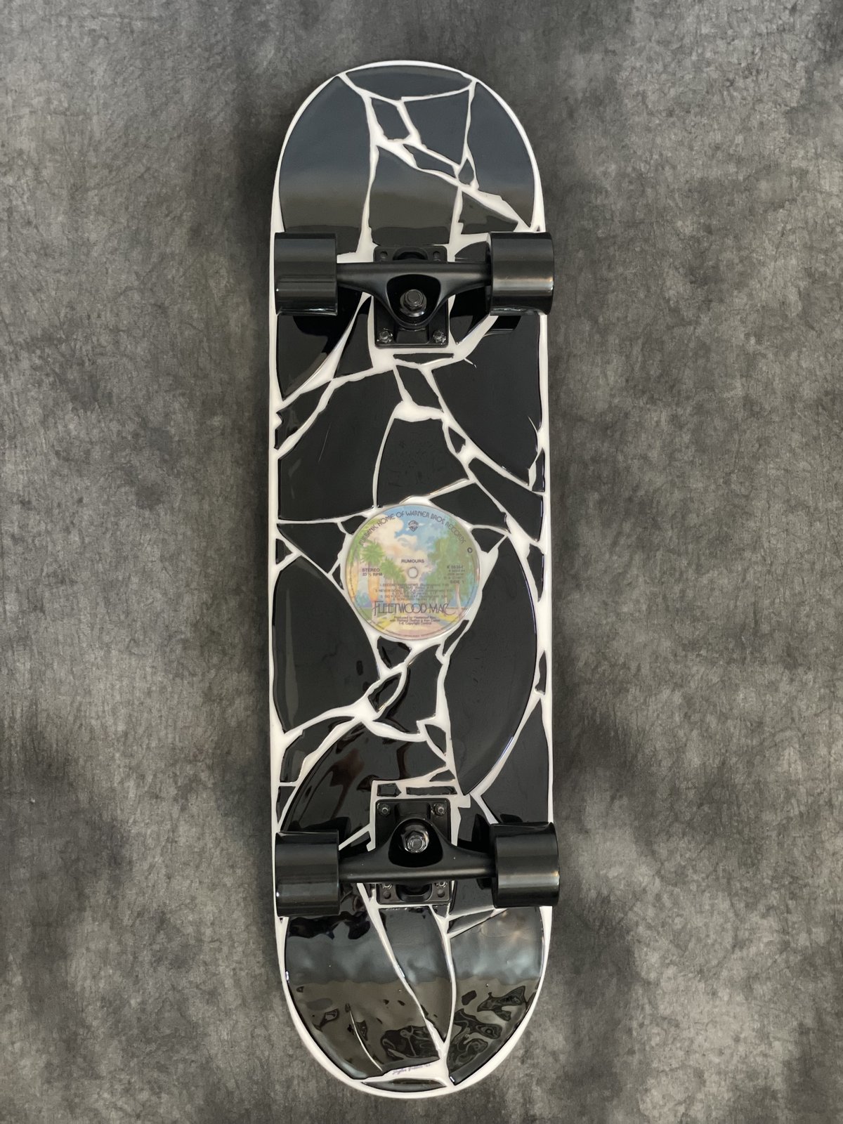 Artwork by Skyler Gallun &mdash; vinyl mosaic deck, view 1