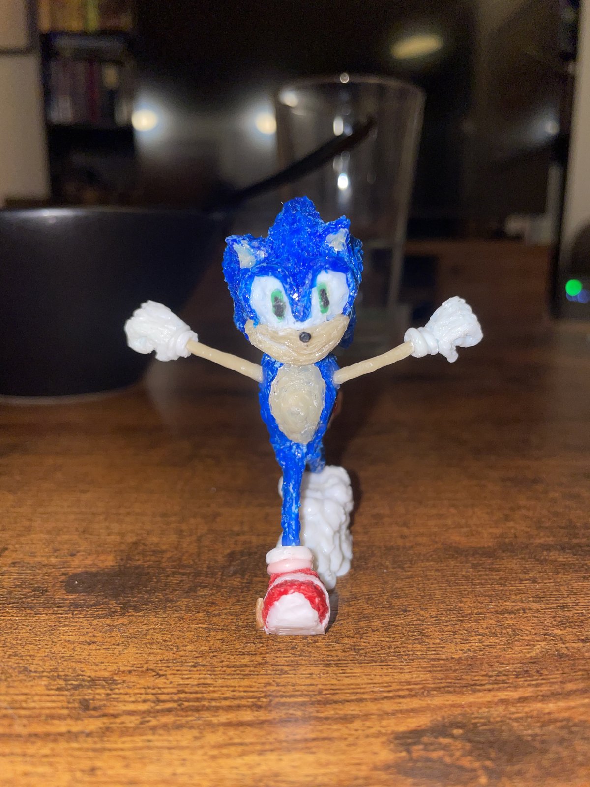 Artwork by Skyler Gallun &mdash; blue running figure, view 2