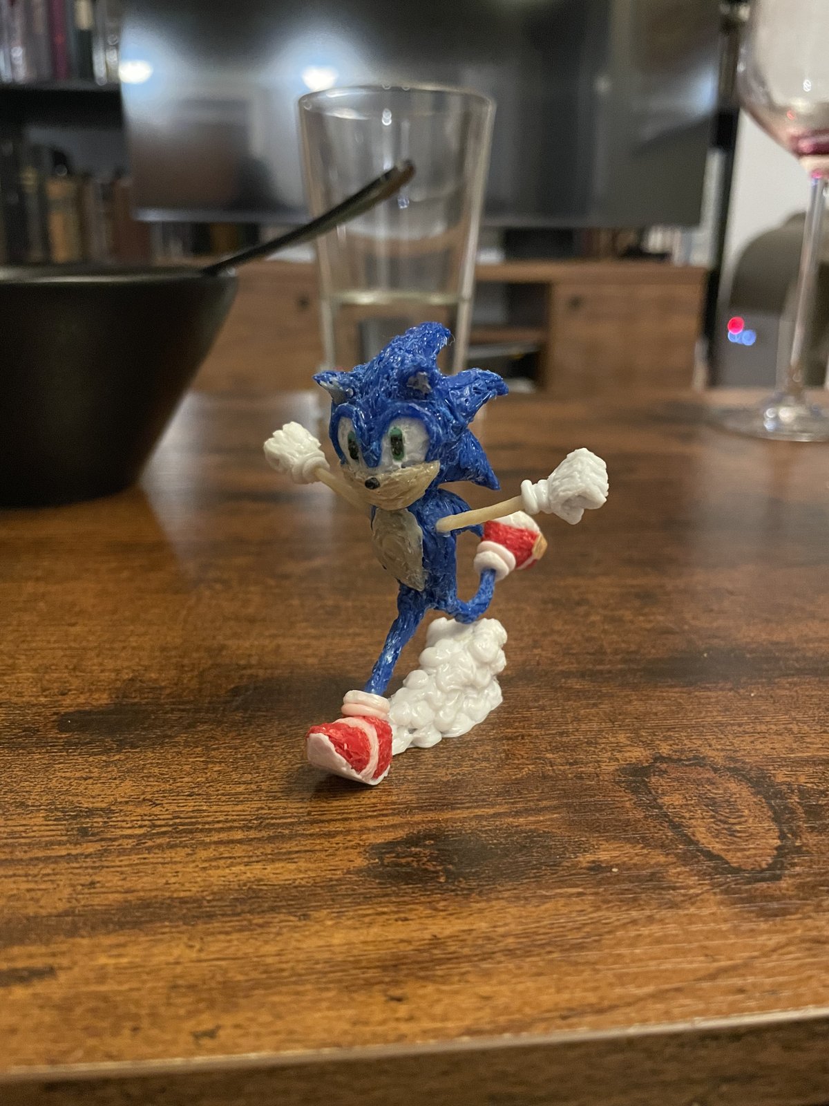 Artwork by Skyler Gallun &mdash; blue running figure, view 1